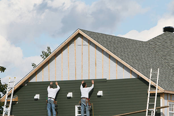 Professional Storm Damage Siding Repair technician working in California, PA